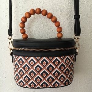 a new day crossbody bag with beaded handle